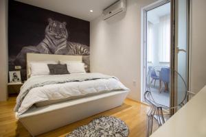 Posteľ alebo postele v izbe v ubytovaní Apartmani Leo-Marin