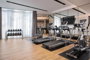 a gym with treadmills and elliptical machines at Fairfield by Marriott Dongguan Changping in Dongguan