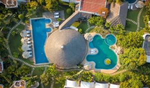 Bazén v ubytování Navutu Dreams Resort & Wellness Retreat nebo v jeho okolí