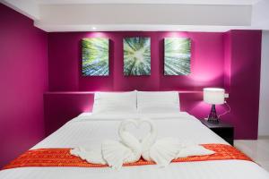 PP@Hotel Rangsit客房内的一张或多张床位