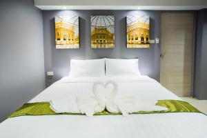 PP@Hotel Rangsit客房内的一张或多张床位