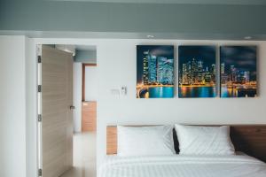 PP@Hotel Rangsit客房内的一张或多张床位