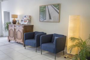 Posezení v ubytování Logis Hôtel Chaptal, Amboise