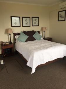 Ein Bett oder Betten in einem Zimmer der Unterkunft Valley Vista Lodge