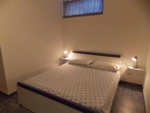 Cama o camas de una habitación en Casa Vacanze Rafel