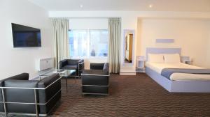 Citrus Hotel Cheltenham by Compass Hospitality tesisinde bir oturma alanı