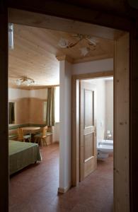Postel nebo postele na pokoji v ubytování Agritur Scoiattolo