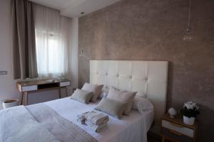 Postel nebo postele na pokoji v ubytování Avantgarde Hotel