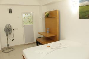 Letto o letti in una camera di Sigiriya Water Guest & View Point Restaurant