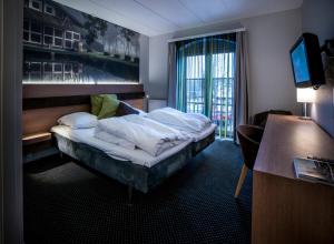 Кровать или кровати в номере Hotel Ry