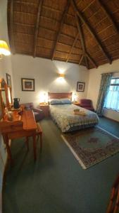 Ένα ή περισσότερα κρεβάτια σε δωμάτιο στο Oaktree Lodge Guest House +33 φωτογραφίες