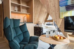 TV a/nebo společenská místnost v ubytování HochLeger - Chalet Refugium am Berg