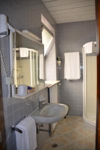 Koupelna v ubytování Hotel Milano