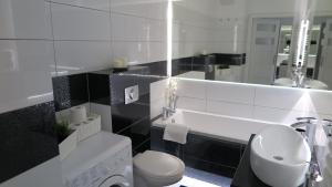 Kúpeľňa v ubytovaní BTS Apartaments - Apartamenty Blisko Morza