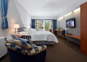 Katil atau katil-katil dalam bilik di Hotel Břízky