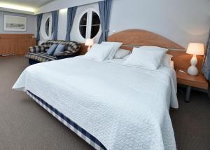 Katil atau katil-katil dalam bilik di Hotel Břízky