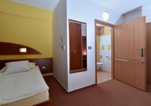 Katil atau katil-katil dalam bilik di Hotel Břízky
