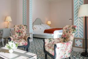 Postel nebo postele na pokoji v ubytování Hotel Cappuccino - Palma