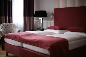Postel nebo postele na pokoji v ubytování Hotel Elba am Kurfürstendamm - Design Chambers