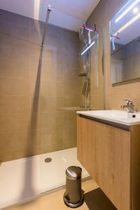 Ванна кімната в Cosy Studio with Sea View in Ostend