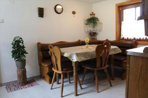 a dining room with a table and chairs at Forstauer's Teichalm in Gams bei Hieflau