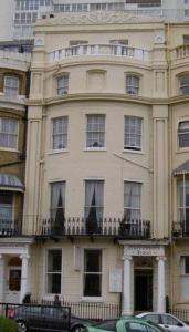 a large building with a large window on the side of it at The Queensbury Hotel in Brighton & Hove