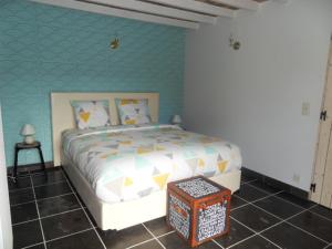Postel nebo postele na pokoji v ubytování B&B 'Het Logiement