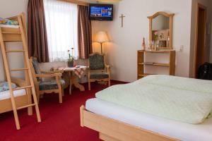 Postel nebo postele na pokoji v ubytování Landhaus St. Georg