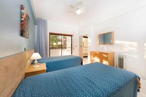 Ein Bett oder Betten in einem Zimmer der Unterkunft Be Smart Terrace Algarve