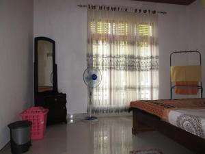 Letto o letti in una camera di Maneesha Guest House