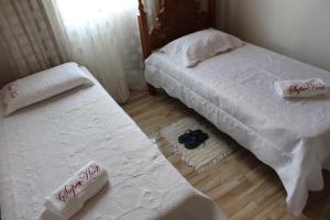 Postel nebo postele na pokoji v ubytování Edicula Fundos