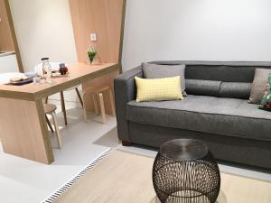 Гостиная зона в Inside Bilbao Apartments