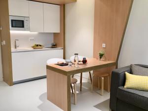 Кухня или мини-кухня в Inside Bilbao Apartments
