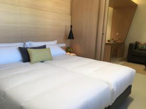 Кровать или кровати в номере Inside Bilbao Apartments
