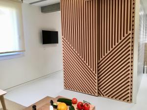 Телевизор и/или развлекательный центр в Inside Bilbao Apartments