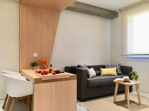 Гостиная зона в Inside Bilbao Apartments