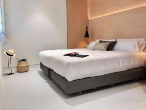 Кровать или кровати в номере Inside Bilbao Apartments