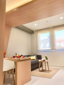 Гостиная зона в Inside Bilbao Apartments