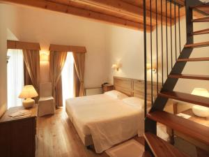 Llit o llits en una habitació de Villa Toderini