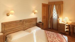 Llit o llits en una habitació de Villa Toderini