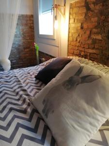 Posteľ alebo postele v izbe v ubytovaní Zucchero sui Baffi- Food Lovers B&B