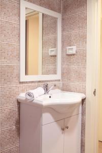 Koupelna v ubytování Idelson Hotel