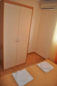 Postel nebo postele na pokoji v ubytování Apartments Zora