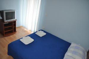Postel nebo postele na pokoji v ubytování Apartments Zora