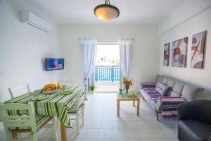 Телевизор и/или развлекательный центр в Sea View Apartments