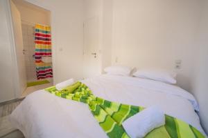 Кровать или кровати в номере Sea View Apartments