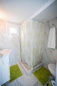 Кровать или кровати в номере Sea View Apartments