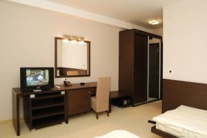 TV a/nebo společenská místnost v ubytování Hotel Golf Luxury