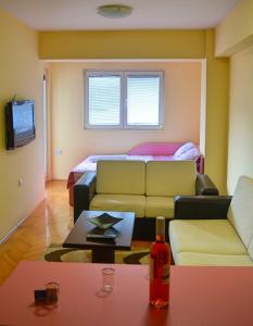 Posezení v ubytování George 59 Apartment