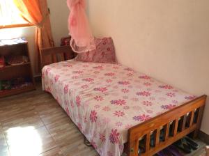 Postel nebo postele na pokoji v ubytování Sunshine Cafe